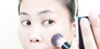 Woman doing makeup