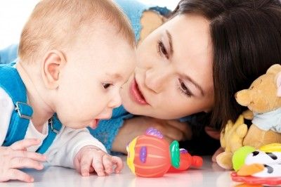 Baby with mother/freedigitalphotos