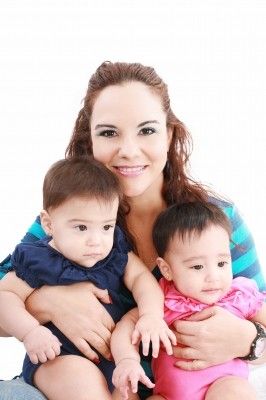 Mother with two kids/freedigitalphotos