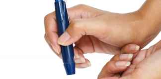 Diabetic Lancet Device In Hand