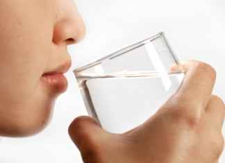 A lady drinking water/freedigitalphotos