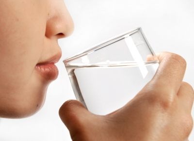 A lady drinking water/freedigitalphotos