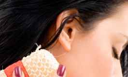 Woman Scrubbing Her Neck