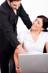 Couple romancing in office/freedigitalphotos