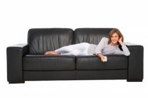A girl sitting on sofa/freedigitalphotos