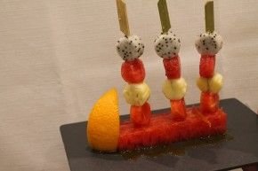 Fresh fruit brochettes with orange and honey sauce