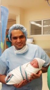 Asad Bashir Khan Khattak with his baby boy