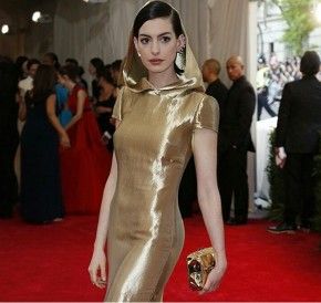 Yay! Anne hathway looked glam in her hooded gold gown