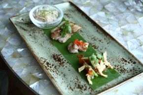 Appetizer platter -Spicy Pomelo salad with vegetables, Grilled chicken spicy Salad,Grilled pork neck Thai Style and Fried Shrimp with Garlic and Pepper