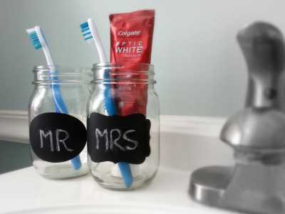 Tooth Brush holder: MAke use of your old mason jar by making it your bathroom accessory: Just paint your old mason jar and use it to keep your toothbrushes.