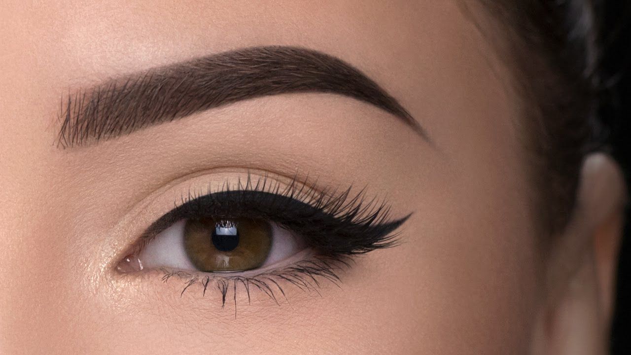 Nude liner and thick brows
