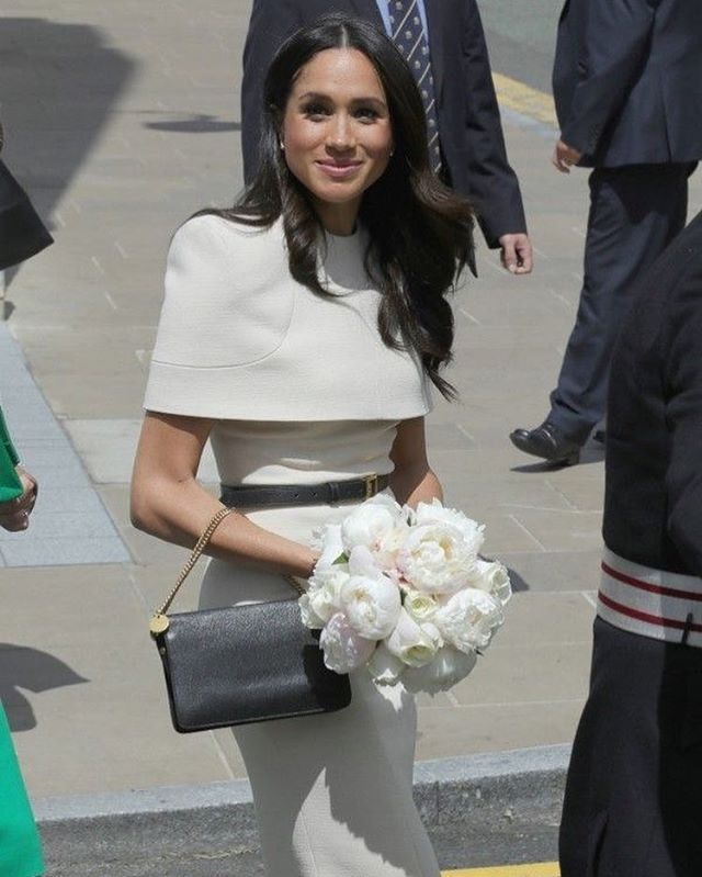 Meghan opted for a Ivory Givenchy Dress at her first royal event with the Queen